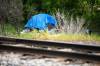 MIKAELA MACKENZIE / FREE PRESS
                                A tent near a rail line along Omands Creek on Wednesday. Two city councillors want to work with railway operators on encampments so the city can enforce its bylaw on rail property which is outside city jurisdiction.