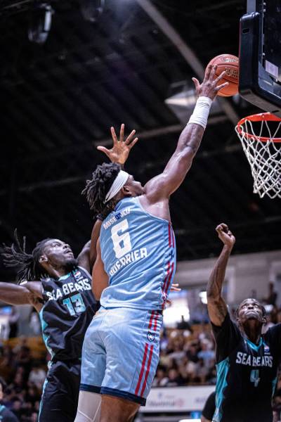 Ryan Marra photo
                                Montreal Allance forward Quincy Guerrier goes above the rim ahead of Winnipeg Sea Bears Nathan Bilamu during CEBL action in Montreal on Friday.