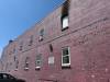 MORGAN MODJESKI / FREE PRESS
                                One person was found dead after a fire inside a suite in a two-storey apartment building in the 400 block of Ross Avenue, Friday.