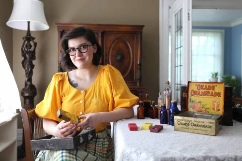 Nicole McLennan first started collecting matchbooks as a teenager. She now sells multi-coloured, high-quality matches imported from Europe and displayed in vintage bottles and vessels. (Ruth Bonneville / Free Press)