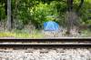 MIKAELA MACKENZIE / FREE PRESS
                                A tent near a rail line along Omands Creek last week.