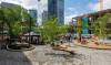 MIKE DEAL / FREE PRESS
                                The renovated park Air Canada Window Park downtown features gardens with Indigenous plants, large trees, a curved metal sculpture with blue and green pieces, wooden benches and a multi-purpose stage.
