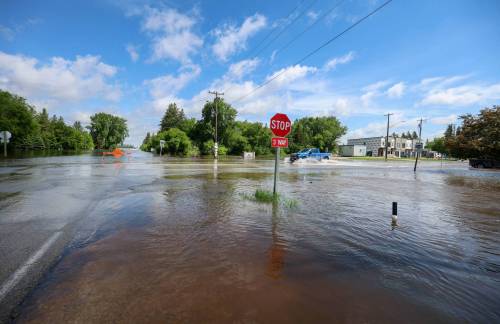 Ruth Bonneville Free Press Local Balmoral flooding View of flooded main intersection in Balmoral Wednesday. The historic weather event on Tuesday, where tornado warnings, hail, and a record-breaking 250 mm of rainfall battered Stonewall, Balmoral, Winnipeg, and surrounding regions, causing major overland flooding and sewer backups causing significant property and residential damage. See story by Malak June 10th, 2026