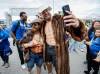 John Woods / The Canadian Press
                                Michelle Perry poses with former Winnipeg Blue Bombers quarterback Chris Streveler, who met fans for a retirement party and look-alike contest before Winnipeg took on Hamilton on Thursday.