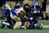 JOHN WOODS / THE CANADIAN PRESS
                                Bombers quarterback Zach Collaros (8) gets sacked by Hamilton&rsquo;s Mario Kendricks (22) during second half CFL football action in Winnipeg on Thursday.