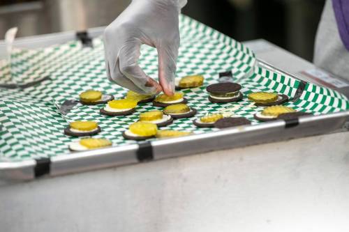 BROOK JONES/FREE PRESS
                                Pickles are added to Oreo cookies before they are dipped in batter and deep-fried.