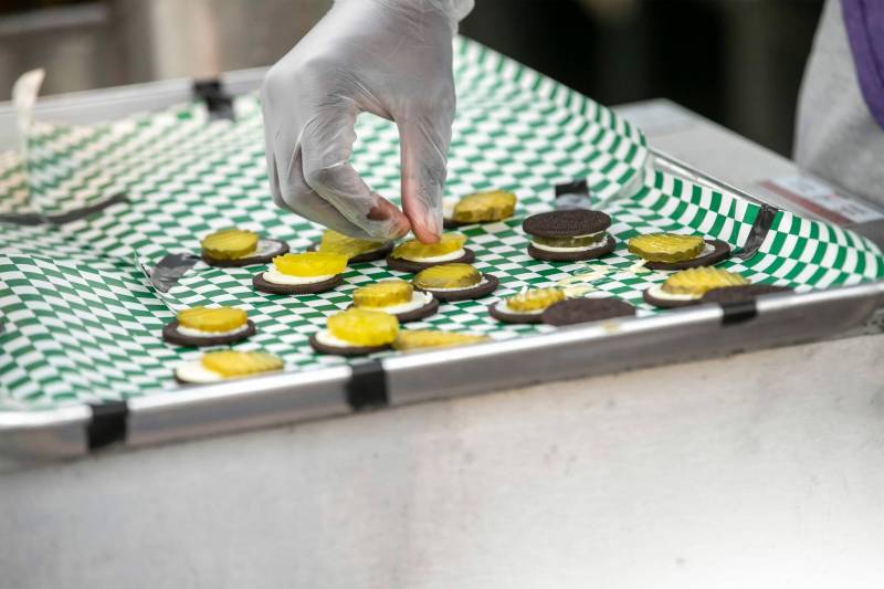BROOK JONES/FREE PRESS
                                Pickles are added to Oreo cookies before they are dipped in batter and deep-fried.