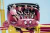 JOHN WOODS / FREE PRESS
                                Charleen McCarthy, from left, with her children Blake and Brooklynn, and their friend Savannah Hanson, ride the Crazy Mouse roller coaster during the Red River Ex on Sunday.