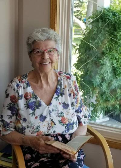 SUPPLIED
                                Maartje Slyker teading her bible while living at Marilyn&rsquo;s place during COVID.