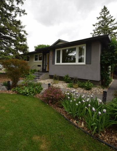 Todd Lewys photos / Free Press
                                The thoughtfully remodelled bungalow at 364 Lockwood St., River Heights North, has a sharp-looking exterior and eye-catching landscaping.