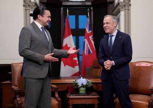 The Canadian Press Files
                                Manitoba Premier Wab Kinew, left, with Prime Minister Mark Carney on Parliament Hill in Ottawa. Kinew and Carney could be at odds over a proposed silica sand mining project in Manitoba.