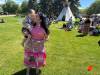 MORGAN MODJESKI / FREE PRESS
                                Diandra Ballantyne, from the Mosakahiken Cree Nation, gives her son Denzin, almost two, a smooch on Indigenous Peoples Day at the Forks in Winnipeg on June 21, 2026. She says the event is about celebrating Indigenous people, but also about the future as well.