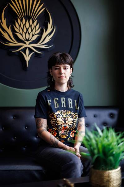 MIKE DEAL / FREE PRESS
                                Justine Proulx at Black Thistle Tattoo is dealing with clients bringing in AI-generated tattoo proposals, some of which are made by feeding her own style into a generative model.
