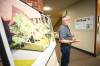 MIKAELA MACKENZIE / FREE PRESS
                                John McNairnay, congregation member and vice-chair of the South Osborne Commons, guides media through the space at the announcement for plans to turn Churchill Park United Church into South Osborne Commons.