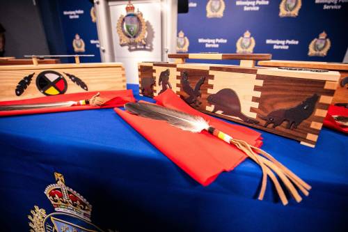 MIKAELA MACKENZIE / FREE PRESS
                                Eagle feathers are regarded as sacred items by Indigenous Peoples. The eagle feather will now be offered by the Winnipeg Police Service for individuals swearing oaths.