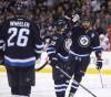 Trevor Hagan / The Canadian Press files
                                Former Winnipeg Jets forward Tobias Enstrom (centre) has joined the roster with former captain Blake Wheeler (left) and defenceman Dustin Byfuglien (right) for the NHL Alumni Game in October at Canada Life Centre.