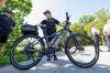 MIKE DEAL / FREE PRESS
                                Winnipeg Police Service Const. Emily Meronyk holds a new e-bike for the Bicycle Patrol Program. The service has trained 25 officers to use 16 newly acquired e-bikes.