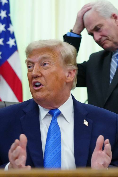 The Associated Press
                                House Majority Whip Tom Emmer, R-Minn. (right) listens as U.S. President Donald Trump speaks in the Oval Office.