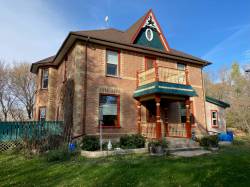 The Browns’ century-old home before the tornado passed through their property. (Supplied)