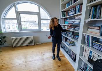 MIKE DEAL / FREE PRESS
                                Meeka Walsh says she remembers every cover of Border Crossings sent to print during her career.