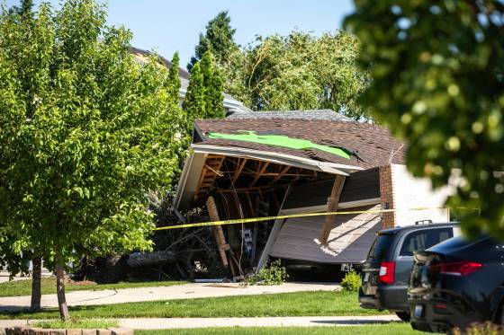 Storm damage in Whyte Ridge on Tuesday. Roofs throughout the neighbourhood had shingles ripped off and thrown into the street. (Mikaela MacKenzie / Free Press0