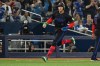 Toronto Blue Jays designated hitter George Springer (4) scores on a Vladimir Guerrero Jr. single against the Texas Rangers during eighth inning MLB baseball action in Toronto on Friday, June 26, 2026. THE CANADIAN PRESS/Jon Blacker