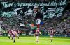 Celtic fans present a tifo featuring manager Martin O'Neill during the Premiership soccer match between Celtic and Heart of Midlothian, in Glasgow, Scotland, Saturday May 16, 2026. (Andrew Milligan//PA via AP)