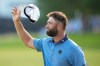 Jon Rahm, of Spain, acknowledges the gallery on the 18th green after his round during the final round of the PGA Championship golf tournament at Aronimink Golf Club, Sunday, May 17, 2026, in Newtown Square, PA. (AP Photo/Matt Slocum)