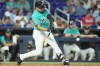 Miami Marlins' Christopher Morel hits a single during the ninth inning of a baseball game against the New York Mets, Sunday, May 24, 2026, in Miami. (AP Photo/Lynne Sladky)