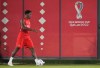 Canada forward Jonathan David walks to the stretching area during practice at the World Cup in Doha, Qatar, Friday, Nov. 25, 2022. THE CANADIAN PRESS/Nathan Denette