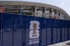 Temporary fencing with FIFA World Cup 2026 signage is set up outside SoFi Stadium, Friday, June 5, 2026, in Inglewood, Calif. (AP Photo/Jae C. Hong)
