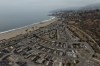 An aerial view shows the cleared site of a mobile home park more than a year after the Palisades Fire in the Pacific Palisades neighborhood of Los Angeles, Thursday, June 4, 2026. (AP Photo/Jae C. Hong)