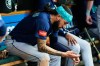 Seattle Mariners' J.P. Crawford (3) sits on the bench after being hit by a pitch against the Detroit Tigers during the third inning of a baseball game Friday, June 5, 2026, in Detroit. (AP Photo/Paul Sancya)