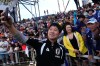Japan head coach Hajime Moriyasu takes a picture with fans after a training session Monday, June 8, 2026, in Nashville, Tenn., ahead of the World Cup soccer tournament. (AP Photo/George Walker IV)