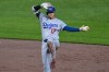 Los Angeles Dodgers' Shohei Ohtani celebrates on second base after driving in a run with a double off Pittsburgh Pirates pitcher Wilber Dotel during the seventh inning of a baseball game in Pittsburgh, Tuesday, June 9, 2026. (AP Photo/Gene J. Puskar)