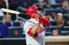 St. Louis Cardinals' Alec Burleson follows through on a two-run home run during the fifth inning of a baseball game against the New York Mets Tuesday, June 9, 2026, in New York. (AP Photo/Frank Franklin II)