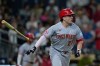 Cincinnati Reds' Sal Stewart watches his two-run home run during the eleventh inning of a baseball game against the San Diego Padres Tuesday, June 9, 2026, in San Diego. (AP Photo/Gregory Bull)