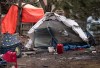 Tents are seen at an unhoused encampment in Montreal on Wednesday, April 1, 2026.  THE CANADIAN PRESS/Christinne Muschi