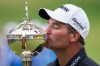 Ryan Fox of New Zealand kisses the trophy after winning the RBC Canadian Open in Caledon, Ont. on Sunday, June 8, 2025. THE CANADIAN PRESS/Andrew Lahodynskyj