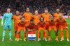 FILE - Netherlands'players, goalkeeper Bart Verbruggen, Nathan Ake, Virgil van Dijk, Frenkie de Jong, Matthijs de Ligt, and Cody Gakpo, rear row from left, and Tijjani Reijnders, Jurrien Timber, Xavi Simons, Memphis Depay and Donyell Malen, front row from left, pose for a team photo prior to a World Cup 2026 group G qualifying soccer match between Netherlands and Lithuania in Amsterdam, Netherlands, Monday, Nov. 17, 2025. (AP Photo/Peter Dejong, File)