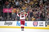Carolina Hurricanes center Jordan Staal celebrates an empty-net goal by left wing Nikolaj Ehlers during the third period in Game 4 of the NHL hockey Stanley Cup Final series against the Vegas Golden Knights, Tuesday, June 9, 2026, in Las Vegas. (AP Photo/John Locher)