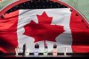 FIFA President Gianni Infantino, from left to right, United States President Donald Trump and Mexican President Claudia Sheinbaum look on as Prime Minister Mark Carney draws Canada during the FIFA World Cup draw at the Kennedy Center, in Washington, Friday, Dec. 5, 2025. THE CANADIAN PRESS/Adrian Wyld