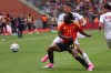 Tunisia's Adem Arous challenges for the ball with Belgium's Jeremy Doku during the international friendly soccer match between Belgium and Tunisia in Brussels, Belgium, Saturday, June 6, 2026. (AP Photo/Omar Havana)