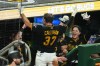 Pittsburgh Pirates' Tyler Callihan (37) takes a curtain call on the dugout steps after hitting a three-run home run off Los Angeles Dodgers pitcher Kyle Hurt during the eighth inning of a baseball game in Pittsburgh, Wednesday, June 10, 2026. (AP Photo/Gene J. Puskar)