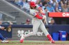 Philadelphia Phillies' Alec Bohm (28) hits a three run home run off Toronto Blue Jays pitcher Max Scherzer during third  inning MLB baseball action in Toronto on Wednesday June 10, 2026. THE CANADIAN PRESS/Chris Young