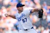 Kansas City Royals starting pitcher Seth Lugo throws during the first inning of a baseball game, Wednesday, June 10, 2026, in Kansas City, Mo. (AP Photo/Charlie Riedel)