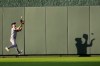 Texas Rangers center fielder Evan Carter catches a line drive for the out on Kansas City Royals' Maikel Garcia during the third inning of a baseball game Wednesday, June 10, 2026, in Kansas City, Mo. (AP Photo/Charlie Riedel)