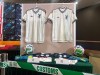 Hong Kong customs authorities showcase real jersey, left, and fake jersey, right, during a news conference at its headquarters in North Point, Hong Kong Thursday, June 11, 2026. (AP Photo/Kanis Leung)