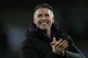 FILE - Wolverhampton Wanderers' head coach Rob Edwards celebrates after the English Premier League soccer match between Wolverhampton Wanderers and Liverpool in Wolverhampton, England, on March 3, 2026. (AP Photo/Dave Shopland, File)