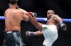 FILE - Derrick Lewis, right, kicks Waldo Cortes Acosta in a heavyweight bout during the UFC 324 mixed martial arts event, Jan. 24, 2026, in Las Vegas. (AP Photo/Steve Marcus, File)